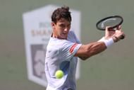 Ugo Carabelli retrieves a ball in Shanghai | Image Source: Getty